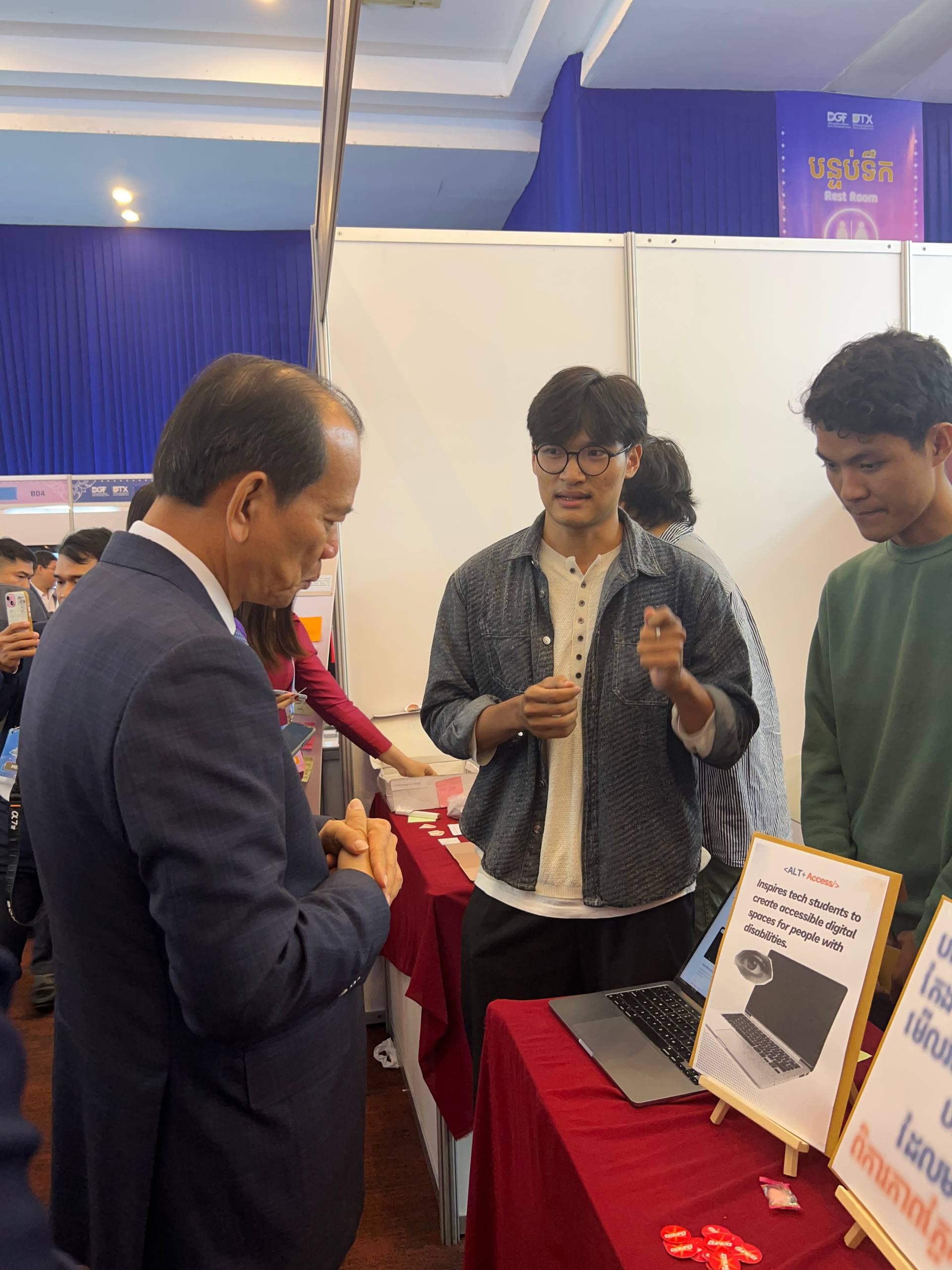 Presenting to H.E. Mr. VANDETH CHEA, the Minister of Ministry of Post and Telecommunications